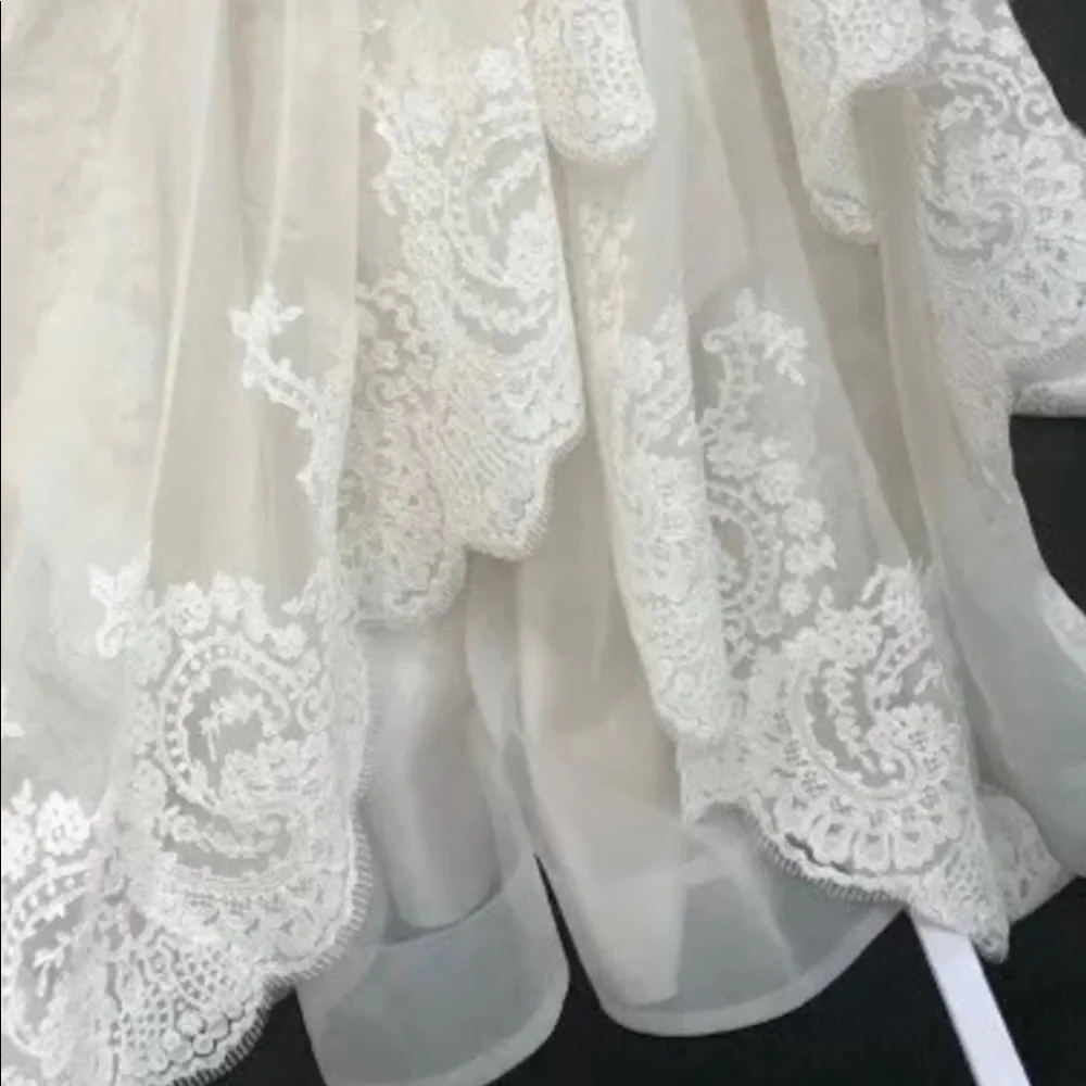 Justin Alexander Signature Sweetheart  Gown
cathedral length veil. - Picture 3 of 7
